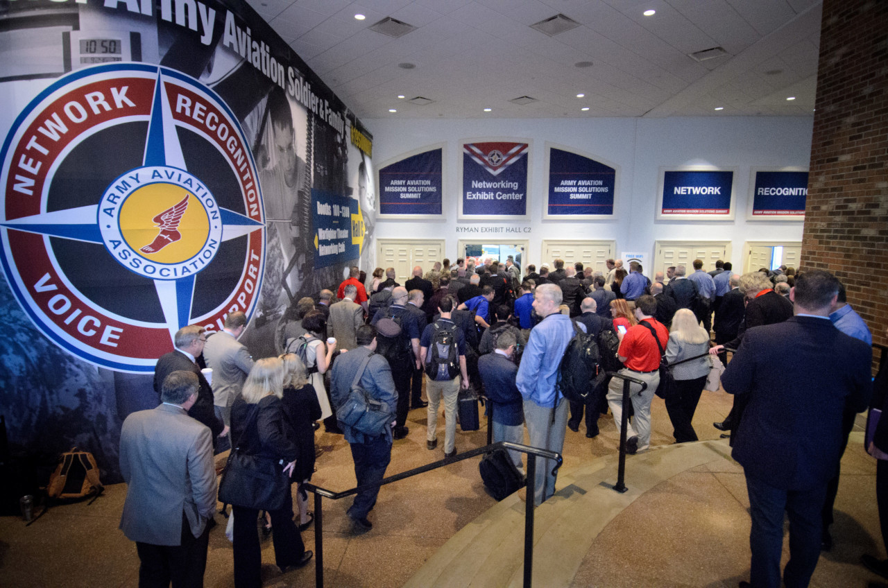 Attendees shuffle into the entrance of the AAAA Summit 2022 venue.